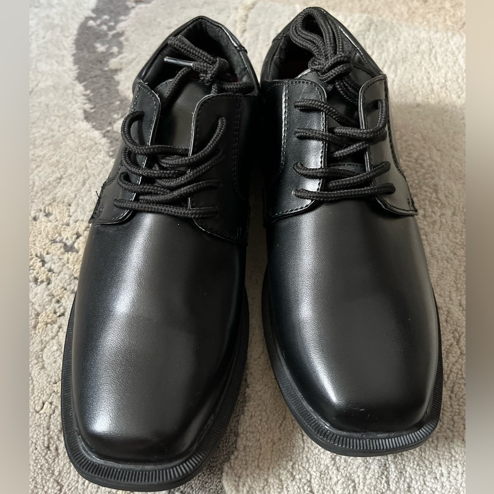 Black Madison Avenue boys dress shoes. Gently worn.